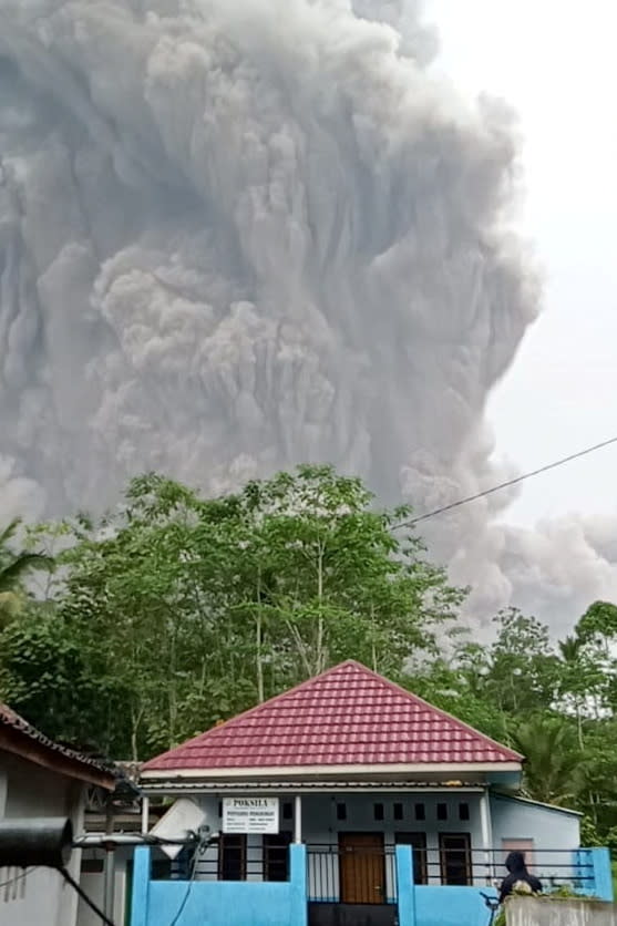 Mount Semeru volcano spews volcanic ash during an eruption as seen from Oro-oro Ombo, Pronojiwo district, in Lumajang regency, East Java province, Indonesia, December 4, 2021, in this photo taken by Antara Foto. Antara Foto/National Disaster Mitigation Agency (BNPB)/ via REUTERS   ATTENTION EDITORS - THIS IMAGE HAS BEEN SUPPLIED BY A THIRD PARTY. MANDATORY CREDIT. INDONESIA OUT. NO COMMERCIAL OR EDITORIAL SALES IN INDONESIA.