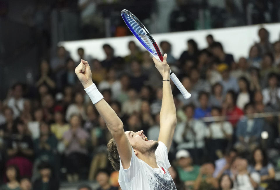 Daniil Medvedev of Russia celebrates after defeating Kei Nishikori of Japan during their single's final match at the Japan Open men's tennis tournament in Tokyo Sunday, Oct. 7, 2018. (AP Photo/Eugene Hoshiko)