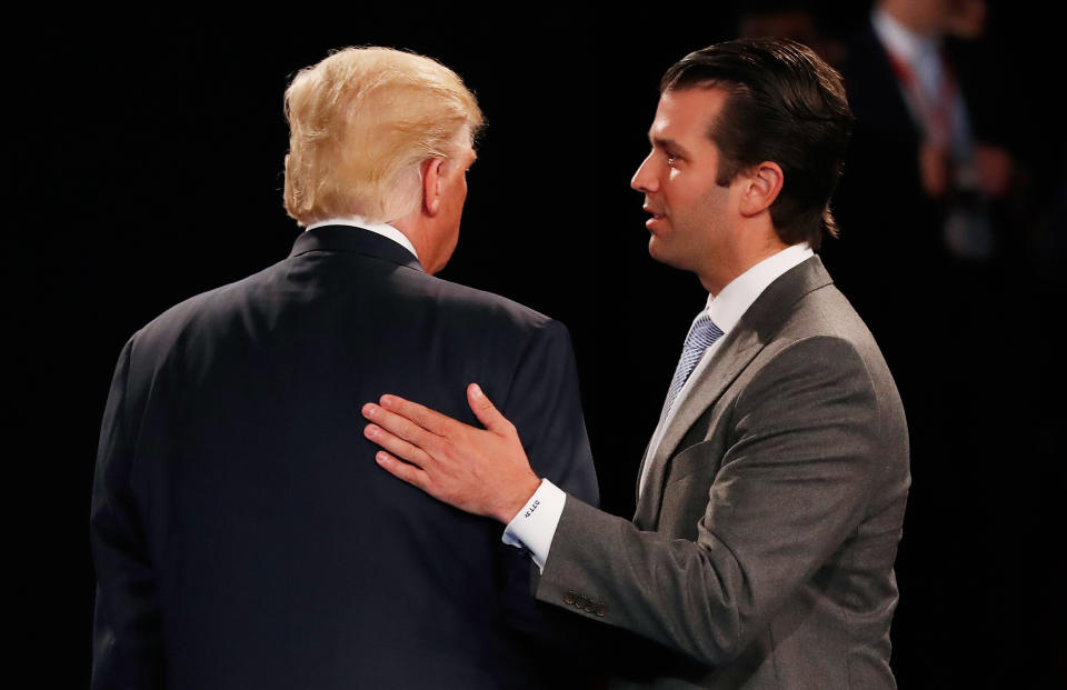 Donald Trump Jr. greets his father during a town hall debate in St. Louis, Oct. 9, 2016. (Photo: Rick Wilking-Pool/Getty Images)