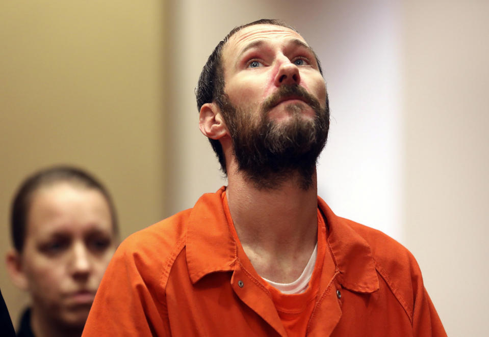 Johnny Bobbitt stands during a hearing Burlington County Courthouse in Mt. Holly, N.J. on Friday Dec. 14, 2018. Bobbitt will be released from county jail and live in his apartment in Philadelphia. Prosecutors say Bobbitt conspired with Katelyn McClure and her former boyfriend, Mark D'Amico, to concoct a feel-good story about Bobbitt giving McClure his last $20 when her car ran out of gas. They raised $400,000, which authorities say was spent on luxury items and casino trips. (David Swanson /The Philadelphia Inquirer via AP, Pool)