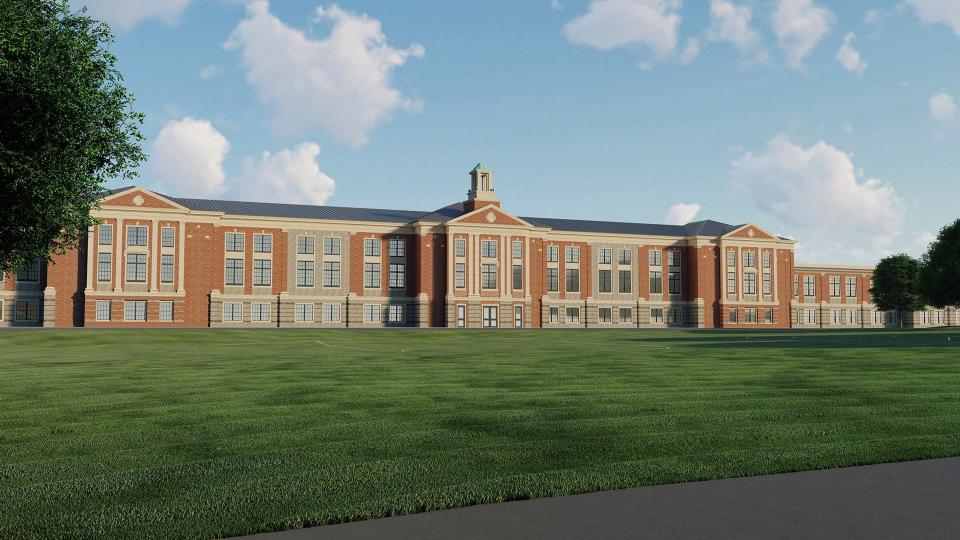 A proposed rendering of a redesigned Thomas Worthington High School would provide larger windows, red brick as well as some light buff stone-colored brick and light buff stone.