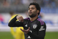 Bayern's Serge Gnabry celebrates after he scored his side's fourth goal during a German Bundesliga soccer match between SV Darmstadt 98 and Bayern Munich in Darmstadt, Germany, Saturday, March 16, 2024. (AP Photo/Michael Probst)