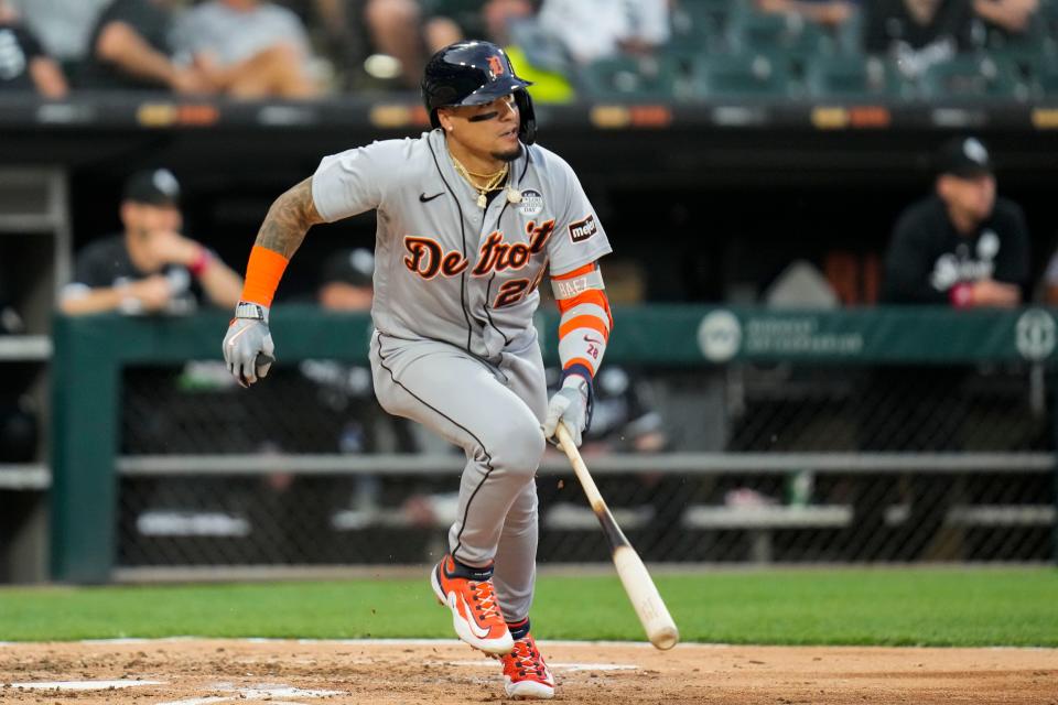 Detroit Tigers' Javier Baez heads to first base after hitting a triple during the fourth inning against the Chicago White Sox at Guaranteed Rate Field in Chicago on Friday, June 2, 2023.