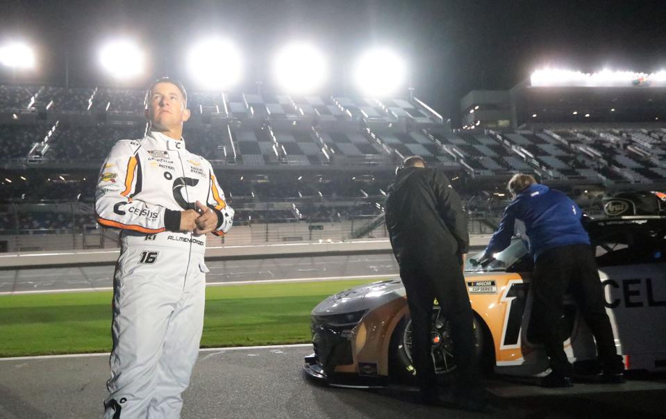 AJ Allmendinger looks up at the giant TV as he waiits for his qualifying run, Wednesday, February 14, 2024 during Daytona 500 qualifying at Daytona International Speedway.