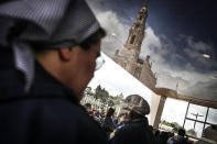 <p>A pilgrim prays to Our Lady of Fatima at the Sanctuary of Fatima, Portugal, May 11, 2017. Pope Francis will preside at the commemoration of the centenary of the ‘apparitions’ of Our Lady to the three Shepherds in Cova da I would go to the Shrine of Fatima. (Photo: M¡Rio Cruz/EPA) </p>