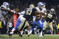 <p>Alex Okafor #57 of the New Orleans Saints forces a fumble on Matthew Stafford #9 of the Detroit Lions during the first half of a game at the Mercedes-Benz Superdome on October 15, 2017 in New Orleans, Louisiana. (Photo by Jonathan Bachman/Getty Images) </p>
