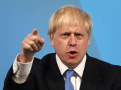 Boris Johnson gestures as he speaks after being announced as the new leader of the Conservative Party in London, Tuesday, July 23, 2019. Brexit champion Boris Johnson won the contest to lead Britain's governing Conservative Party on Tuesday, and will become the country's next prime minister. (AP Photo/Frank Augstein)