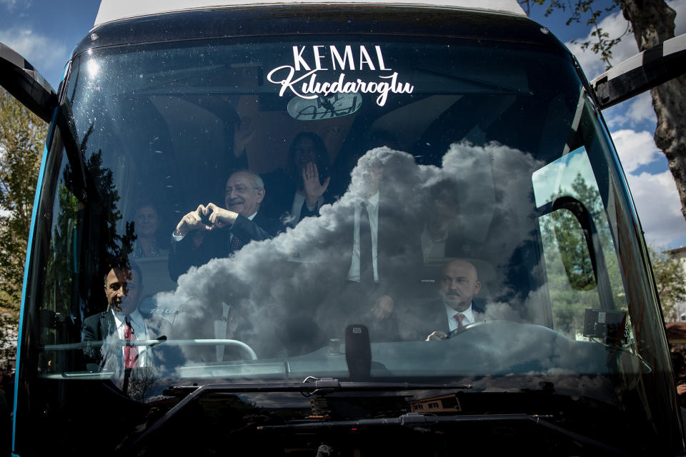 Kılıçdaroğlu waves to supporters from inside his campaign bus on April 21 in Adiyaman, Turkey. The CHP leader visited Turkey's quake-hit provinces during campaigning ahead of the May 14 parliamentary and presidential elections.<span class="copyright">Burak Kara—Getty Images</span>