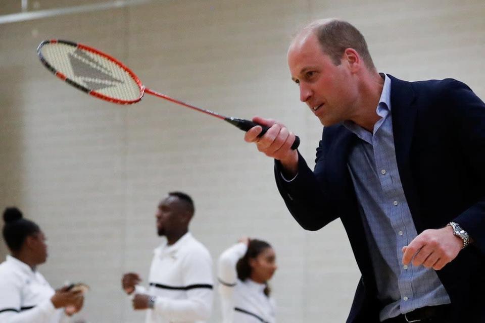 The Duke of Cambridge plays badminton during a visit to Sports Key (Peter Nicholls/PA) (PA Wire)