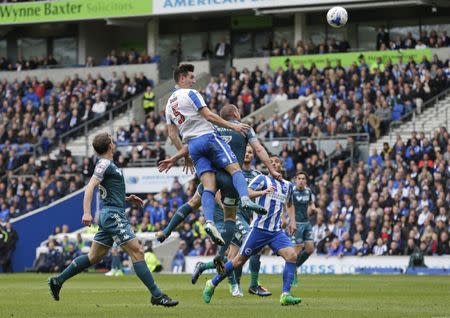 Britain Football Soccer - Brighton & Hove Albion v Wigan Athletic - Sky Bet Championship - The American Express Community Stadium - 17/4/17 Lewis Dunk of Brighton and Hove Albion heads at goal. Action Images / Henry Browne Livepic