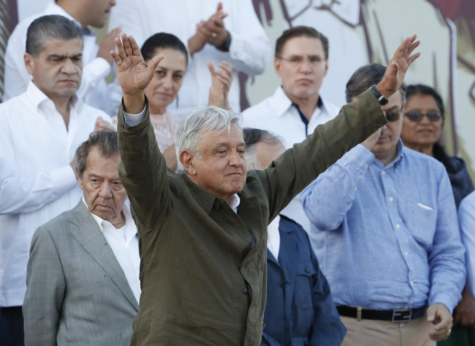 Mexican President Andres Manuel Lopez Obrador receives the applause of the crowd during a rally in Tijuana, Mexico, Saturday, June 8, 2019. Mexican President Andres Lopez Obrador held the rally in Tijuana even as President Trump has put on hold his plan to begin imposing tariffs on Mexico on Monday, saying the U.S. ally will take "strong measures" to reduce the flow of Central American migrants into the United States. (AP Photo/Eduardo Verdugo)