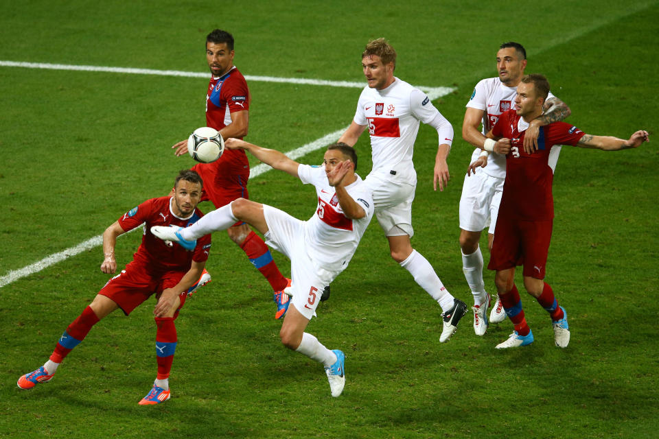 WROCLAW, POLAND - JUNE 16: Dariusz Dudka of Poland wins the ball during the UEFA EURO 2012 group A match between Czech Republic and Poland at The Municipal Stadium on June 16, 2012 in Wroclaw, Poland. (Photo by Clive Mason/Getty Images)