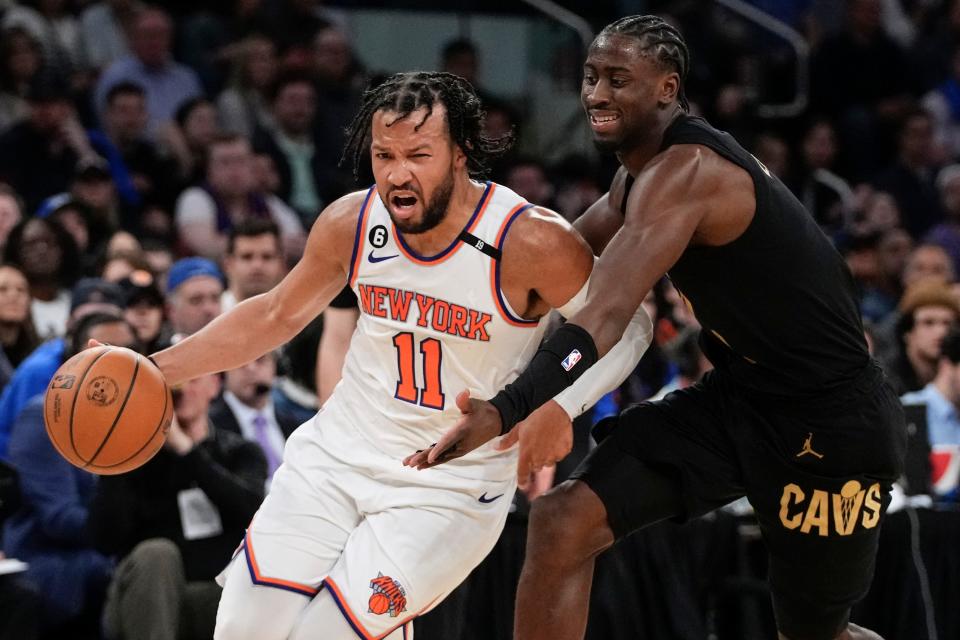 New York Knicks' Jalen Brunson (11) drives past Cleveland Cavaliers' Caris LeVert (3) during the second half of Game 3 in an NBA basketball first-round playoff series Friday, April 21, 2023, in New York. The Knicks won 99-79. (AP Photo/Frank Franklin II)