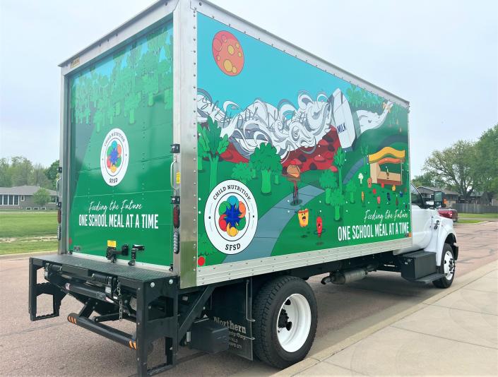 The rear and passenger's side of the new Sioux Falls School District's child nutrition trucks, as seen at the Instructional Planning Center on May 23, 2022.