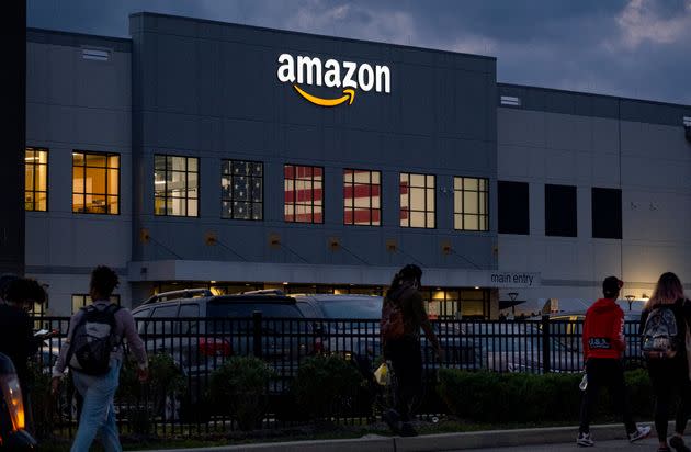 People arrive for work at JFK8, the Amazon fulfillment center on Staten Island, New York, where workers voted to unionize. (Photo: via Associated Press)