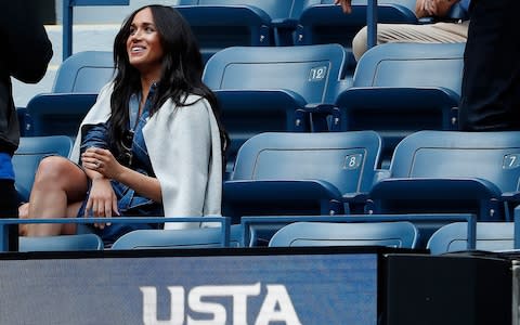 Meghan watches her friend Serena from the player's box at the US Open - Credit: Geoff Burke&nbsp;