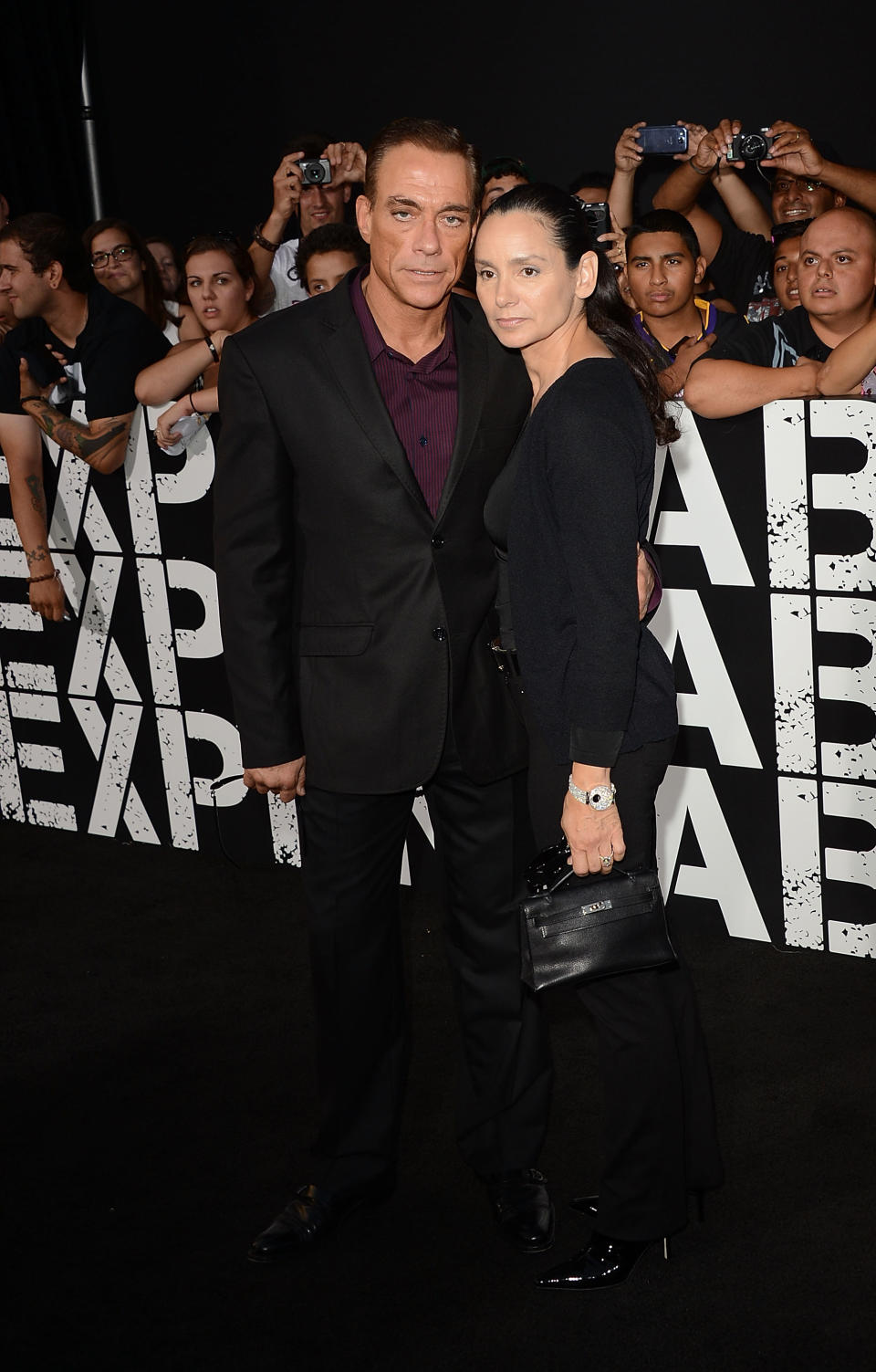 Jean-Claude Van Damme and guest at the Los Angeles premiere of "the Expendables 2" on Auguest 15, 2012.