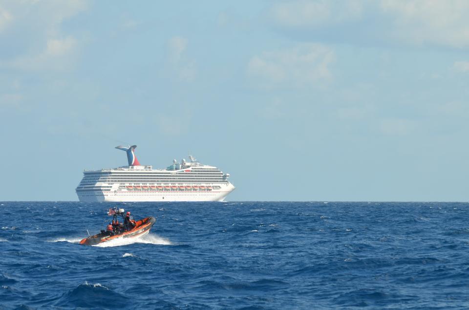 In this handout from the U.S. Coast Guard, the cruise ship Carnival Triumph sits idle February 11, 2013 in the Gulf of Mexico. According to the Coast Guard, the ship lost propulsion power February 10, after a fire broke out in the engine room.
