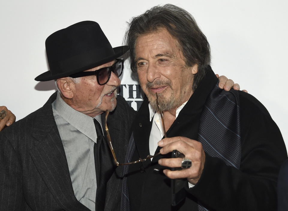 Joe Pesci, left, and Al Pacino speak as they attend the world premiere of "The Irishman" at Alice Tully Hall during the opening night of the 57th New York Film Festival on Friday, Sept. 27, 2019, in New York. (Photo by Evan Agostini/Invision/AP)