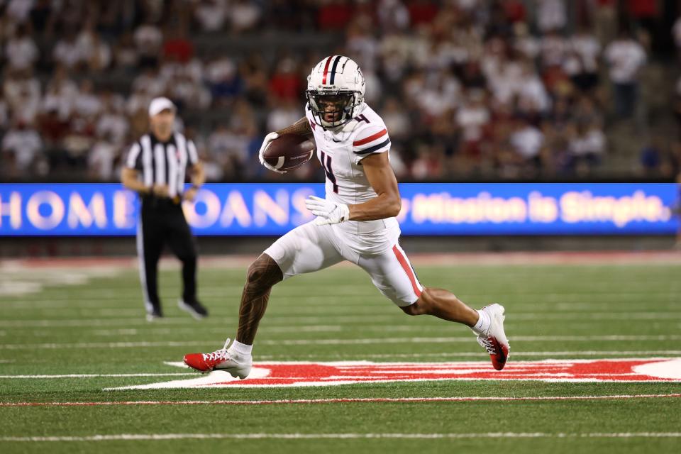 Wide receiver Tetairoa McMillan (4) of the Arizona Wildcats runs during the second half against the New Mexico Lobos at Arizona Stadium on Aug. 31, 2024, in Tucson.