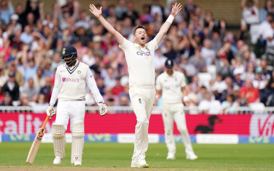 Ollie Robinson celebrates the wicket of India's Jasprit Bumrah - PA