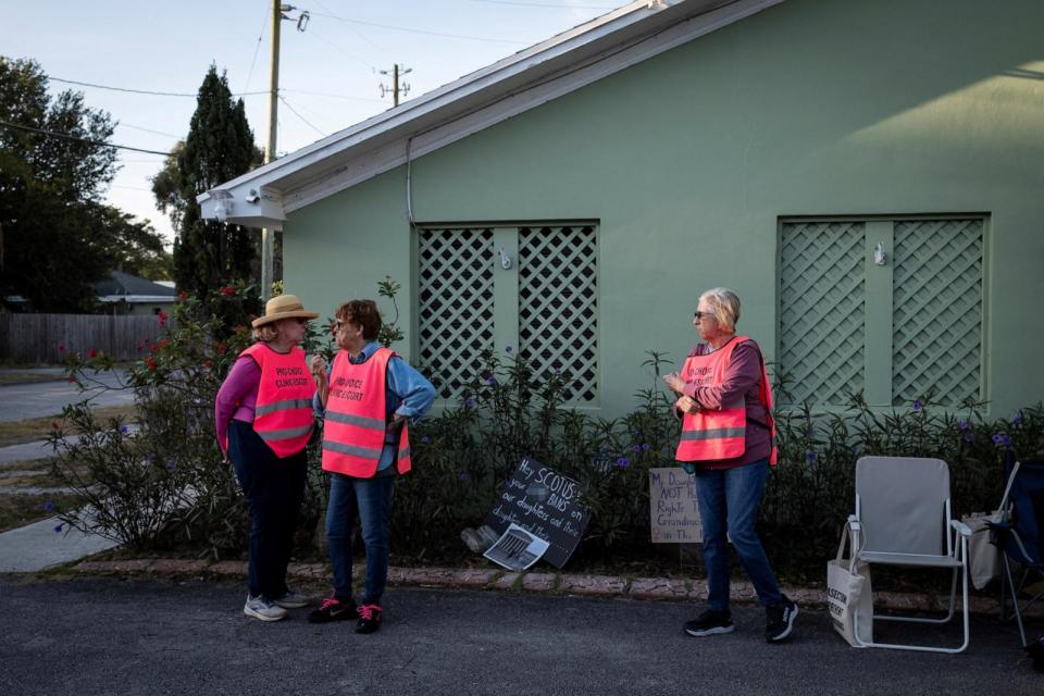 PHOTO: Clinic escorts stand at the parking lot outside an abortion clinic in Fort Pierce, Fla., on April 27, 2024.  (Marco Bello/Reuters)