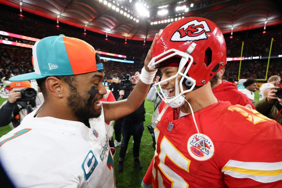 Kansas City Chiefs quarterback Patrick Mahomes, right, greets Miami Dolphins quarterback Tua Tagovailoa after their game at Deutsche Bank Park in Frankfurt, Germany on Nov. 5, 2023.