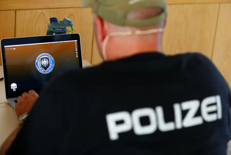 An investigator of the Cybercrime Intelligence Unit of Germany's Bundeskriminalamt (BKA) Federal Crime Office is pictured during a media day in Wiesbaden, Germany, July 27, 2016. REUTERS/Ralph Orlowski