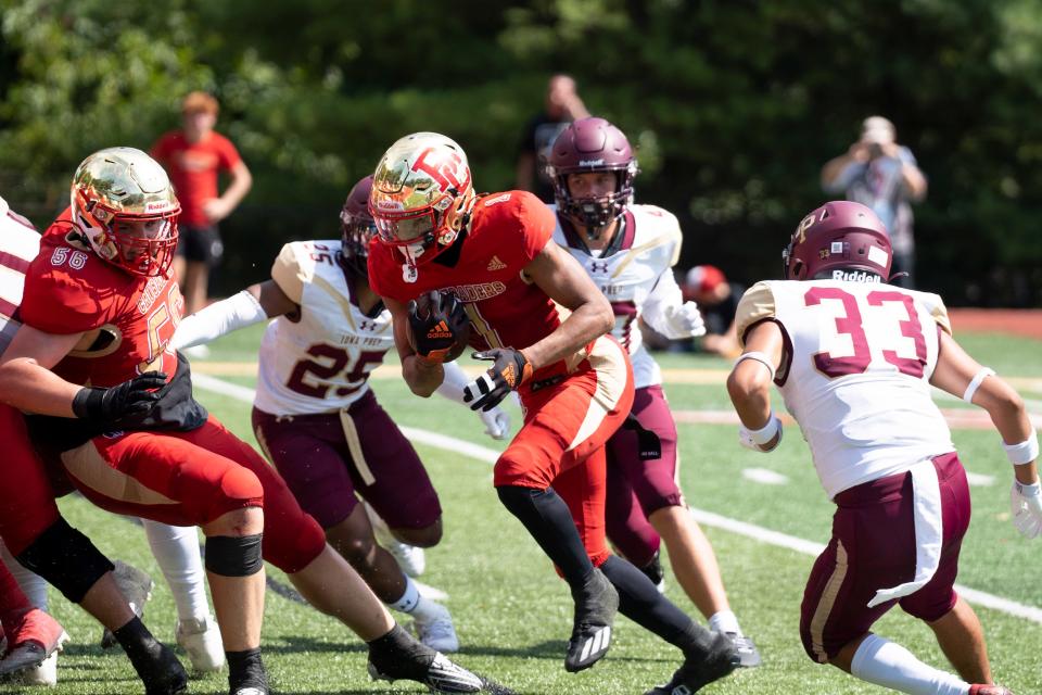 Sept 2, 2023; Oradell, NJ, USA; Iona Prep (NY) at Bergen Catholic (NJ) in a high school football game on Saturday, Sept. 2, 2023. (Center) BC #1 Kaj Sanders on his way to scoring a touchdown in the second quarter. Mandatory Credit: Michael Karas-The Record