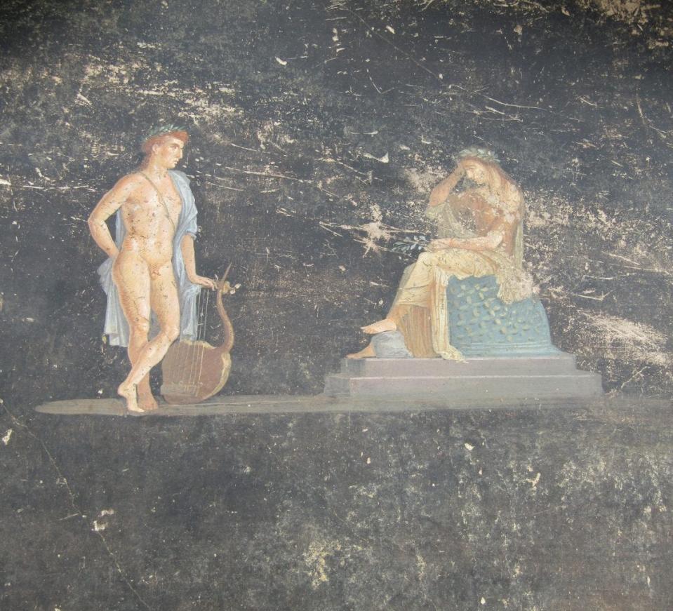 A painting of Apollo and Cassandra recently recovered in Pompeii.