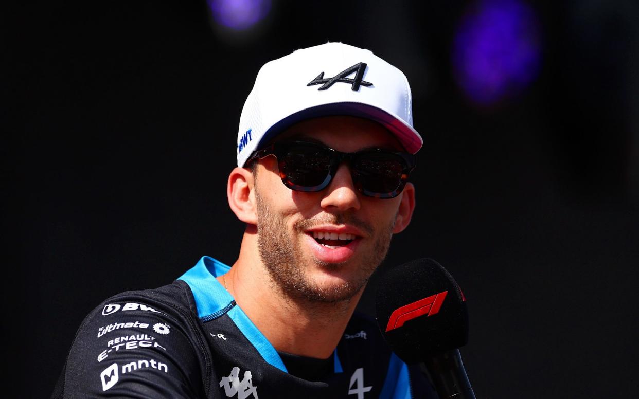 Pierre Gasly speaking to the crowd at a fans event