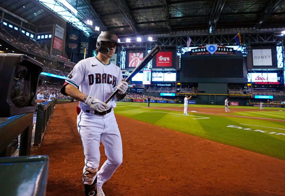 Diamondbacks outfielder Corbin Carroll (7) comes out of the dugout in the eighth inning to head to the plate against the Pirates during a game at Chase Field in Phoenix on July 8, 2023.