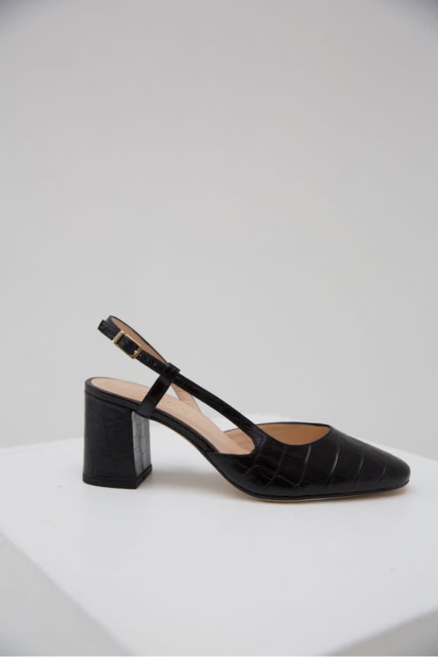 Musier Paris Sling Back Mathilde, $161.46, <a href="https://www.musier-paris.com/en/accueil/178-639-sling-back-mathilde.html#/11-color-black/19-shoe_size-36" rel="nofollow noopener" target="_blank" data-ylk="slk:available here;elm:context_link;itc:0;sec:content-canvas" class="link ">available here</a>.