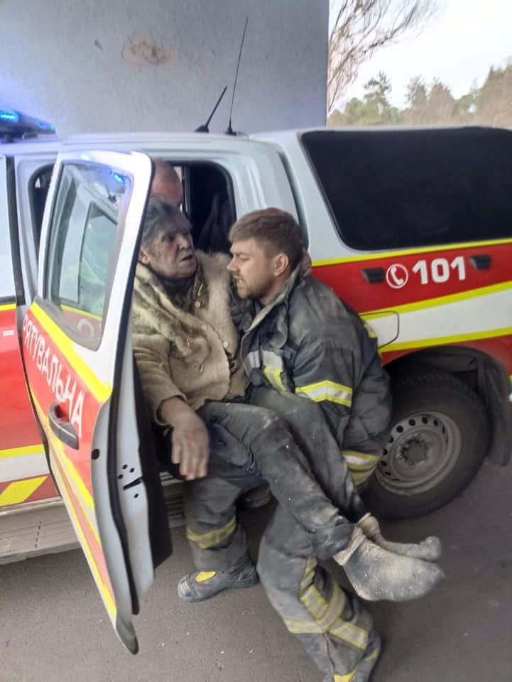 A rescuer carries a woman who was removed from debris after a military strike, as Russia's attack on Ukraine continues, in the town of Rubizhne, in Luhansk region, Ukraine April 6, 2022. Press service of the State Emergency Service of Ukraine/Handout via REUTERS THIS IMAGE HAS BEEN SUPPLIED BY A THIRD PARTY.