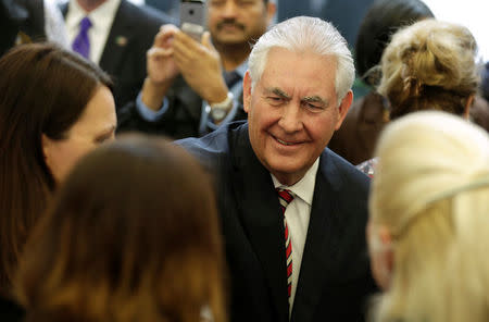 U.S. Secretary of State Rex Tillerson greets Department of State employees upon arrival at the Department of State in Washington, U.S., February 2, 2017. REUTERS/Joshua Roberts