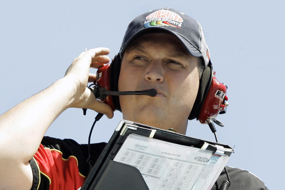 FILE - In this Aug. 17, 2007, file photo, crew chief Steve Letarte watches Jeff Gordon during practice for the NASCAR 3M Performance 400 at Michigan International Speedway in Brooklyn, Mich., in this Friday, Aug. 17, 2007, file photo. NBC analyst Steve Letarte moonlights as the competition consultant for Spire Motorsports, a position he never imagined would put him back on top of a pit box. When COVID-19 protocols sidelined the regular crew chief, Letarte agreed to get back on top of a pit box Sunday, Feb. 28, 2021, at Homestead-Miami Speedway. He'll call the race for Corey LaJoie, his first time as crew chief since the 2014 season finale. (AP Photo/Paul Sancya, File)