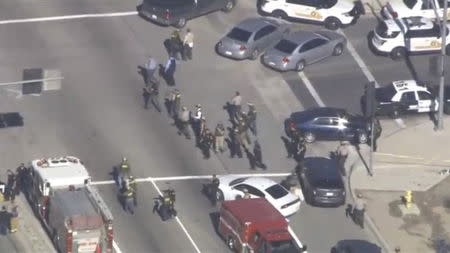 A still image from a video footage courtesy of Nbcla.com shows first responders responding to a shooting at the California Department of Developmental Services Inland Regional Center, one of 21 facilities serving people with developmental disabilities, in San Bernardino, California December 2, 2015. REUTERS/NBCLA.COM/Handout