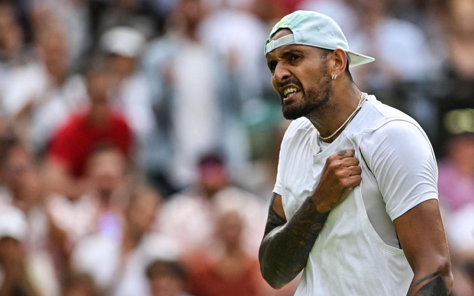 Australia's Nick Kyrgios celebrates winning a point against US Brandon Nakashima during their round of 16 men's singles tennis match on the eighth day of the 2022 Wimbledon Championships at The All England Tennis Club in Wimbledon, southwest London, on July 4, 2022 - Glyn Kirk/AFP