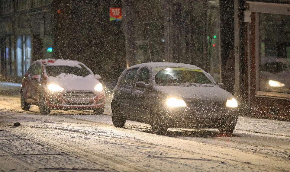 The Met Office warned of travel delays and road closures after snow fell across the north of England.