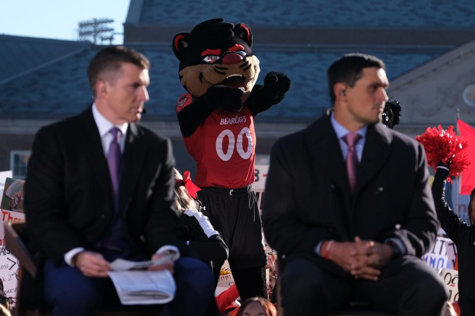 The University of Cincinnati Bearcat entertains as Rece Davis and David Pollack of  ESPN's 'College GameDay' holds a segment on the secondary stage during the broadcast's first appearance at UC Saturday, Nov. 6, 2021, at The Commons on UC Main Campus.