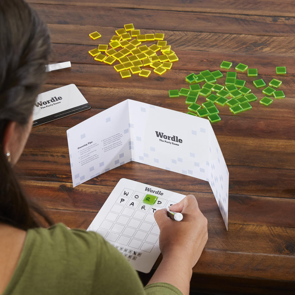 This photo shows Wordle: The Party Game. Board games are among the many amusements for adults that make great holiday gifts. (Hasbro and The New York Times via AP)