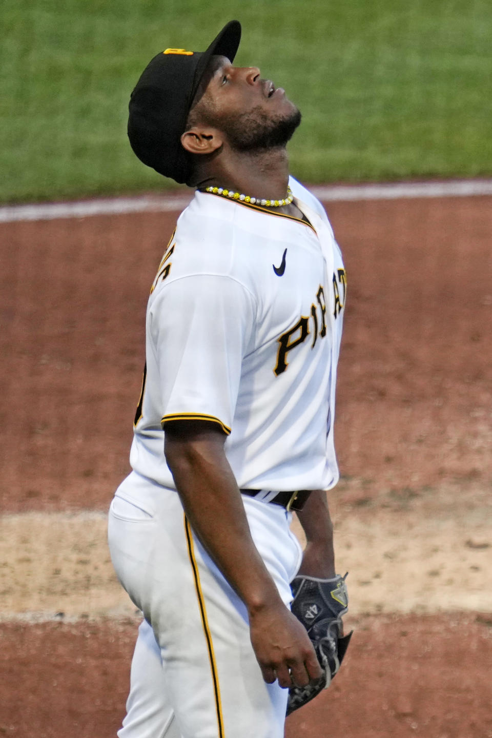 Pittsburgh Pirates starting pitcher Roansy Contreras collects himself after giving up a single to St. Louis Cardinals' Nolan Gorman, allowing a run to score, during the third inning of a baseball game in Pittsburgh, Friday, June 2, 2023. (AP Photo/Gene J. Puskar)