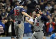 Mar 22, 2017; Los Angeles, CA, USA; USA infielder Nolan Arenado (12) and infielder Eric Hosmer (35) celebrate after both score runs against Puerto Rico in the seventh inning during the 2017 World Baseball Classic at Dodger Stadium. Gary A. Vasquez-USA TODAY Sports