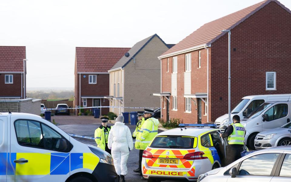 Police at the scene in Meridian Close in Bluntisham - Joe Giddens/PA