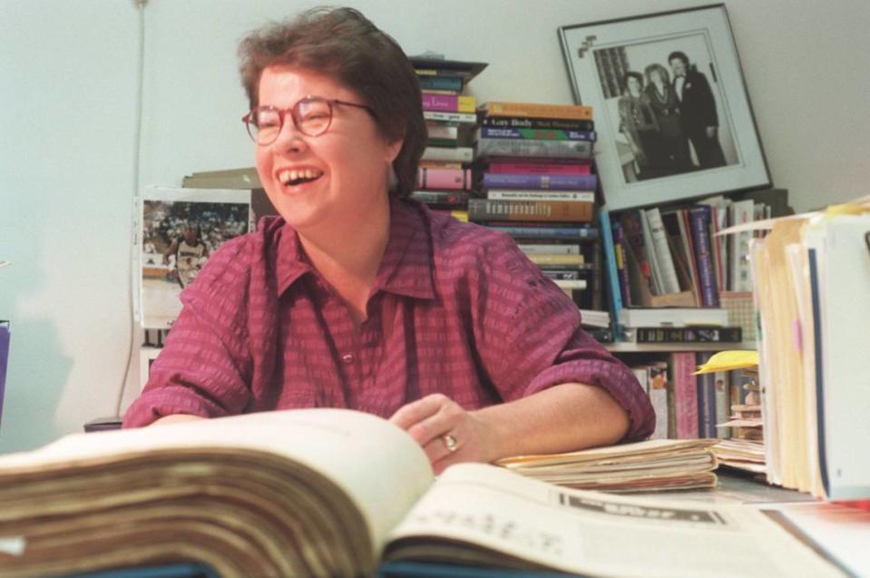 Linda D. Birner, editor and publisher of Mom... Guess What! newspaper looks through bound volumes of the gay newspaper in her office on April 2, 1998, as the Sacramento publication celebrates its 20th anniversary.