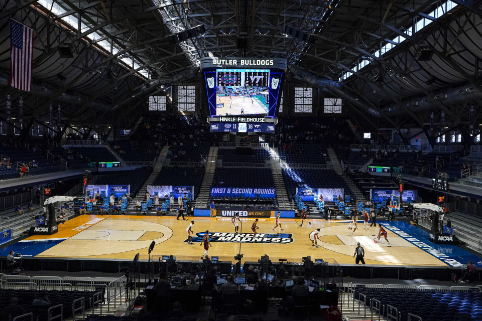 Florida plays against Virginia Tech in the first half of a first round game in the NCAA men's college basketball tournament at Hinkle Fieldhouse in Indianapolis, Friday, March 19, 2021. (AP Photo/Michael Conroy)