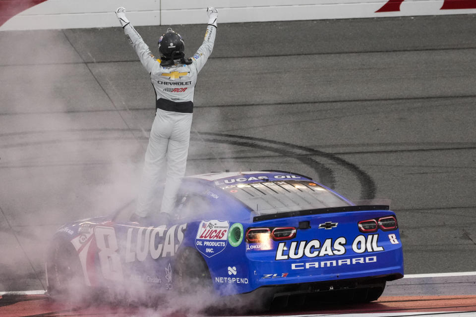 Kyle Busch celebrates after winning a NASCAR Cup Series auto race at Auto Club Speedway in Fontana, Calif., Sunday, Feb. 26, 2023. (AP Photo/Jae C. Hong)