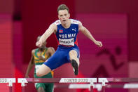 Karsten Warholm, of Norway, wins a men's 400-meter hurdles semifinal at the 2020 Summer Olympics, Sunday, Aug. 1, 2021, in Tokyo. (AP Photo/Petr David Josek)