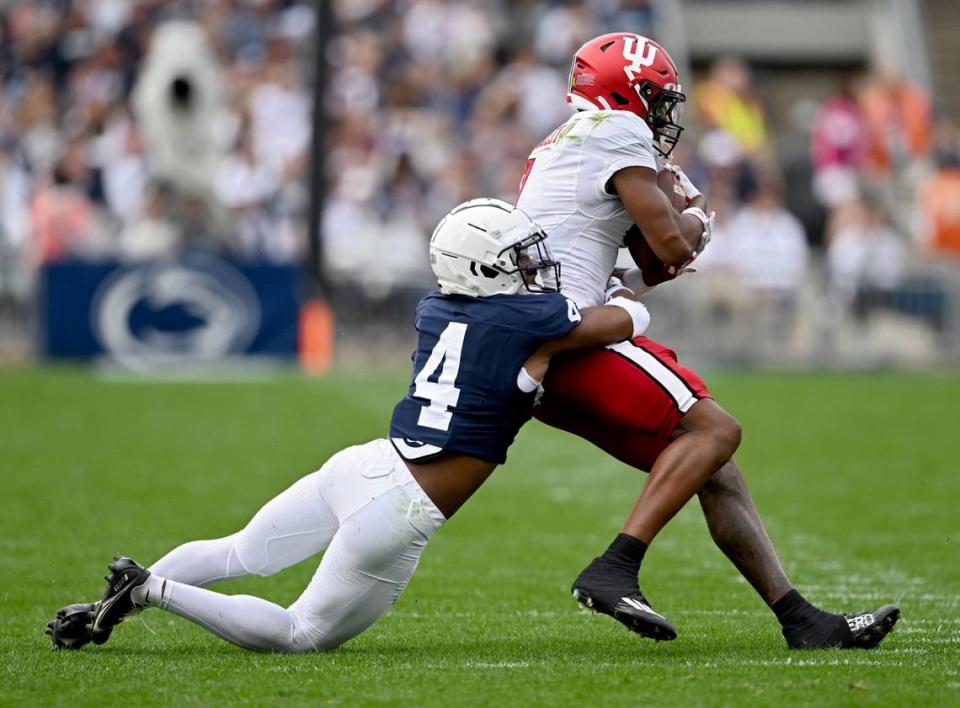 Penn State cornerback Kalen King pulls down Indiana’s Donaven McCulley during the game on Saturday, Oct. 28, 2023.