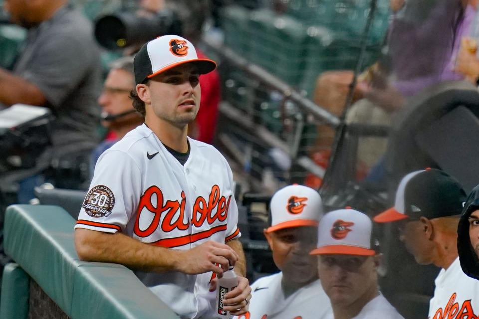 Baltimore Orioles second baseman Terrin Vavra (77) stands in the dugout during the first inning of the game against the Tampa Bay Rays at Oriole Park at Camden Yards.